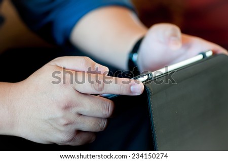 business man's using tablet