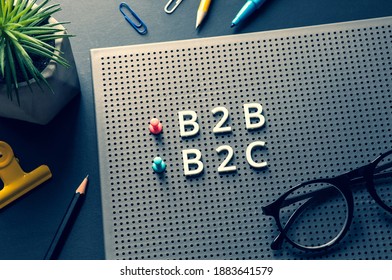 Business marketing with b2b,b2c,c2c text on desk table.management and e-commerce concepts