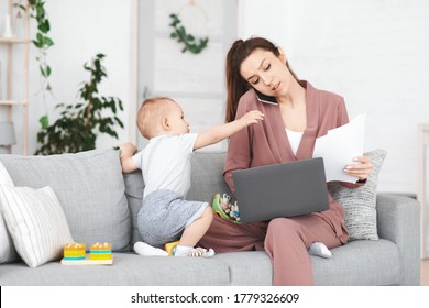 Business And Maternity. Annoyed Mom Trying To Work At Home While Toddler Distracting Her, Young Woman Having Motherhood Stress, Free Space