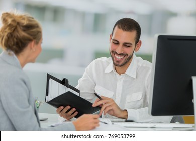 Business Meeting Between American Businesswoman And North African Businessman