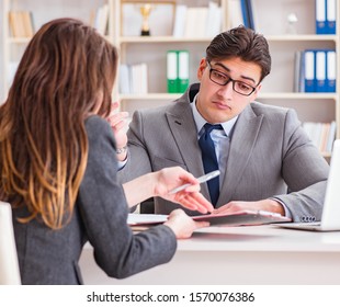 Business meeting between businessman and businesswoman - Shutterstock ID 1570076386