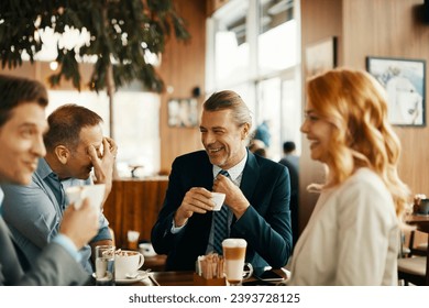 Business meeting in a cafe - Powered by Shutterstock