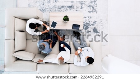 Business meeting, coffee and sofa for planning, b2b collaboration and brainstorming ideas above. Lobby, lounge and technology of corporate worker in teamwork, partnership and workspace coffee break