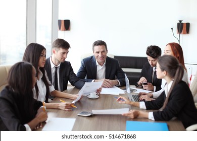 Business Meeting Of Diverse People Around The Table