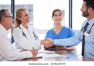 Business, meeting and doctors shaking hands in office for agreement, investment or healthcare deal. Health insurance, men and women with medical consultant for hospital funding, handshake or support - Powered by Shutterstock