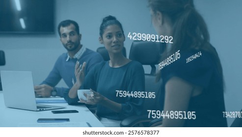 Business meeting with numerical data processing image over diverse professionals in office. teamwork, strategy, technology, collaboration, analysis, workspace