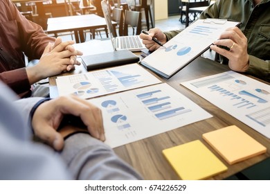 Business meeting office. documents account managers crew working with new startup project Idea presentation, analyze marketing plans - Shutterstock ID 674226529