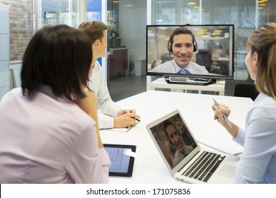 Business Meeting In Office, Group Of Businesspeople In Video Conference  