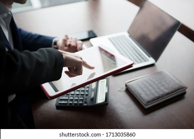 Business Meeting In The Office Working With Laptop And Papers, No Face, Cold Blue Color