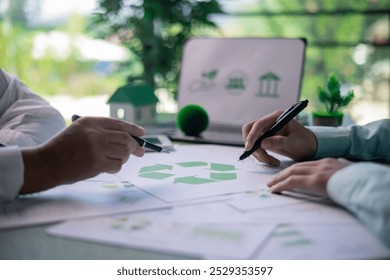 Business meeting on sustainable real estate development. real estate, sustainable development, business meeting, green building, eco-friendly, architecture, planning, construction, investment. - Powered by Shutterstock