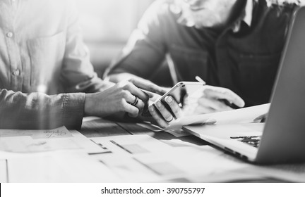 Business Meeting Picture.Photo Young Businessmans Crew Working With New Startup Project In Modern Loft.Generic Design Smartphone Holding Female Hands. Horizontal, Film Effect, Black And White. Blurred