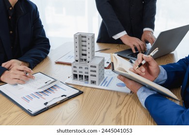 Business meeting of real estate brokers Business working on new startup project, analysis plan, marketing idea presentation