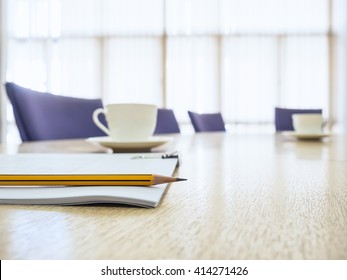 Business meeting Table with Seats Coffee and book Board room Interior 