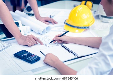 Business Meeting Time with Architecture Interior Designer and Engineering. Meeting and Discussion about Construction Progress in work and Figures denoting of Accounting and Financial