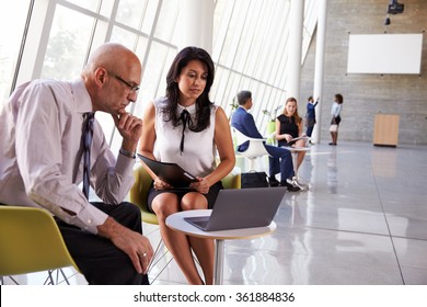 Business Meetings In Busy Office Foyer Area - Shutterstock ID 361884836