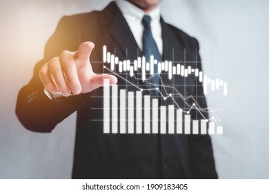 Business men touching on the holographic interface of stock  Rising high And growing up, the concept of strategic planning The growth of financial and investment business.