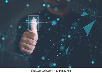 Business men use their thumbs to touch Fingerprint scanning system. Fingerprint scanner technology concept To verify identity.