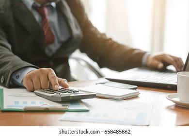 22,580 Man using calculator Images, Stock Photos & Vectors | Shutterstock