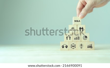 Business mergers and acquisitions concept. Share acquisition, asset business acquisition, amalgamation. Business review and development model. The abbreviation M and A on smart background, copy space.