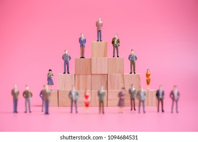 Business Miniature People On Stack Of Wood Cube Building Block