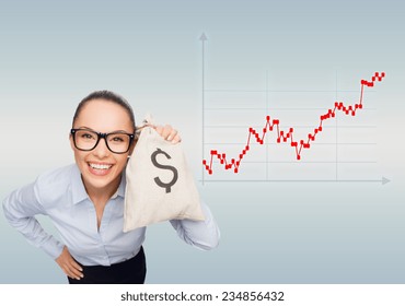 business, money and people concept - smiling businesswoman in eyeglasses holding money bag with dollar over gray background and forex graph - Powered by Shutterstock