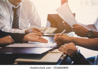 Business negotiation concept; Business people handshaking to sign contract of business at business meeting - Shutterstock ID 1926840890