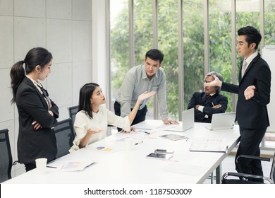 Business Negotiation, Male Partners Arguing, Funny Easygoing Woman Keeping Calm In Stressing Situation, Meditating With Composed Smile, Dealing With Emotional Angry Customer, 
