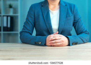 Business Negotiation Skills With Female Executive Sitting At Office Desk With Confident Pose And Hands Crossed, Body Language For Determination And Willpower