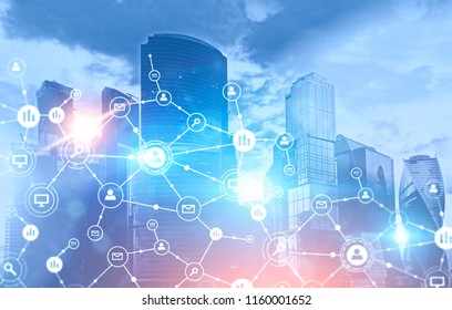 Business network icons glowing blue over cityscape background. Immersive interface and global network. Toned image double exposure mock up