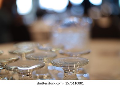 A Business Networking Event With Water And Drinking Glasses, It Has A Very Shallow Depth Of Field And Blurry Background With Glasses Full Of Water.