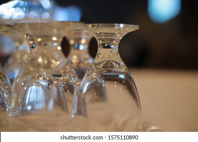 A Business Networking Event With Water And Drinking Glasses, It Has A Very Shallow Depth Of Field And Blurry Background With Glasses Full Of Water.