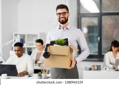 Business, New Job And Quit Concept - Happy Smiling Male Office Worker With Personal Stuff