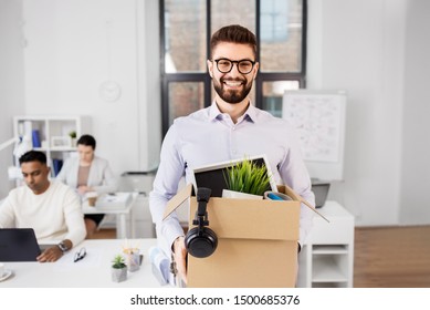 Business, New Job And Quit Concept - Happy Smiling Male Office Worker With Personal Stuff