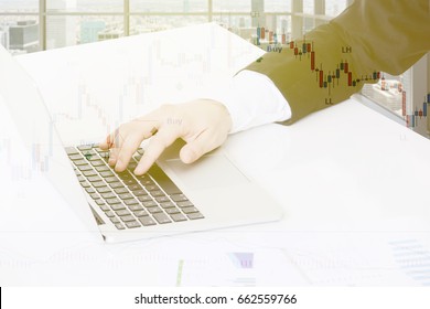 business, office concept - businessman working in office with computer close up and financial concept double exposure.