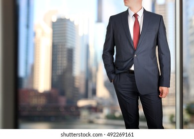 Business And Office Concept -  Elegant Young Fashion  Buisness Man In  A Blue/navy Suit 