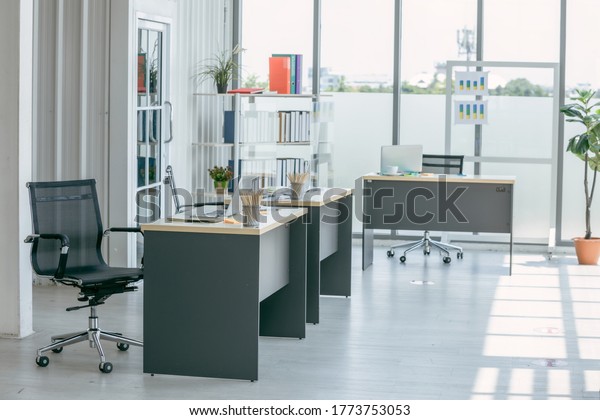 Business office people maintain social\
distancing meeting room. Stop covid-19 coronavirus.Social and\
business distancing new normal\
lifestyle.	