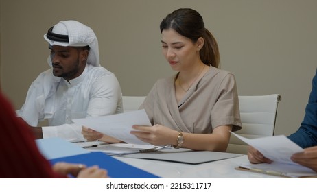 Business Officer Teamwork Brainstorming Talking, Finding Solution And Analyzing Project Using Paperwork To Explain Next Steps To Do Consulting Together In Meeting Room