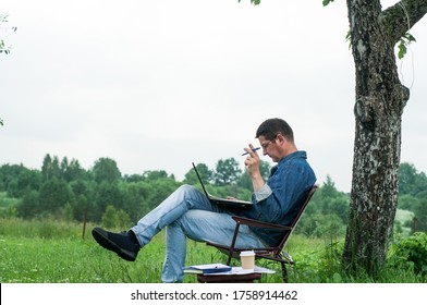 Business Outside. Student Boy Work With Laptop, Computer Tablet In Summer Park. Online Technology With Man Outdoor. Escaped Of Office Distance Education Concept