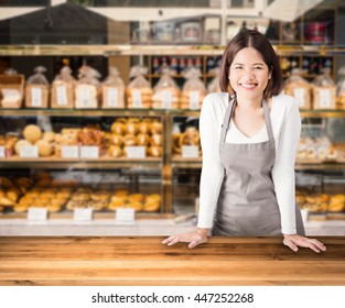 business owner with bakery shop background - Shutterstock ID 447252268