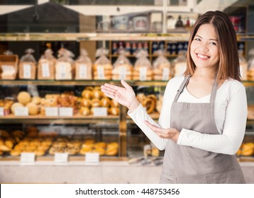 Business Owner With Bakery Shop Background