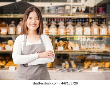 Business Owner With Bakery Shop Background