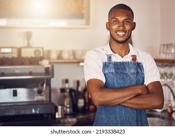 Business owner standing with arms crossed at a cafe, showing pride and success working at a restaurant. Portrait of a waiter, employee or worker giving smile at bakery, looking successful and happy - Powered by Shutterstock