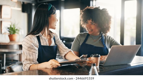 Business owner, teamwork and laptop for restaurant profit, sales and stock inventory management on checklist. Women, waitress or manager with documents, computer and planning budget in a startup cafe - Powered by Shutterstock