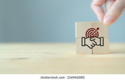 Business partner or mergers and acquisitions concept. Share acquisition, asset business acquisition, amalgamation. Business review and development model. Business common goals and team collaboration. - Shutterstock ID 2169442005