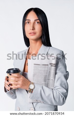 Similar – Young woman stiring coffee looking back