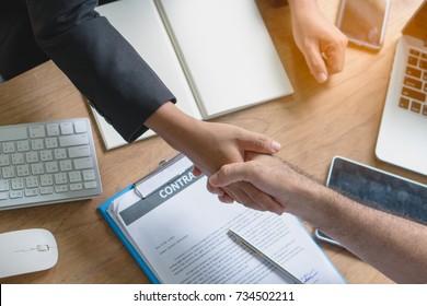 Business partners confirm corporation. Young startup businessman shaking hands with Supplier / client after agree a deal to collaborate for to order supply for his plant.