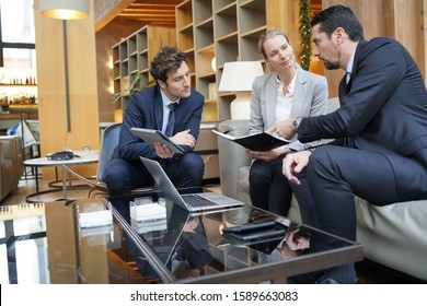 Business Partners Meeting In Hotel Lounge