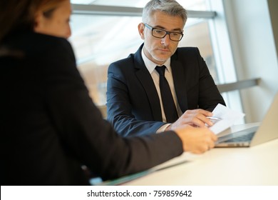 Business partners meeting in office - Shutterstock ID 759859642