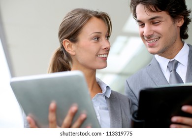 Business Partners Meeting Outside Building