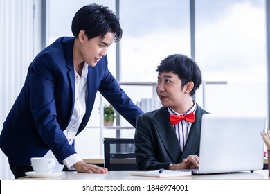 Business Partners Tomboy Lesbian And Coaching Personal Employees Homosexual Businessman LGBT Working And Confident A Successful Business Plan On The Laptop Computer.